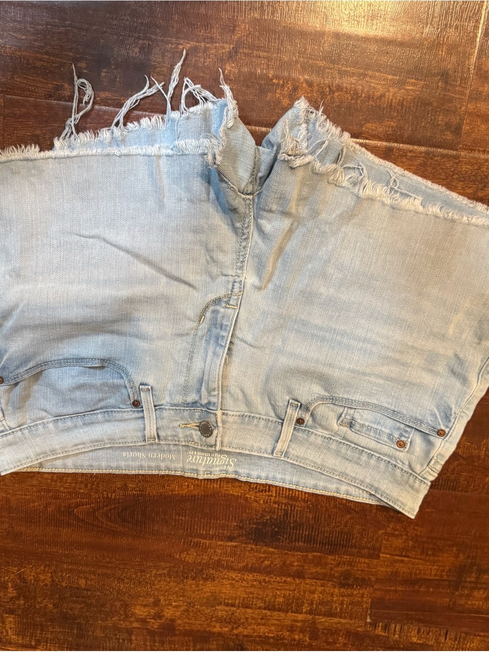 Levi's Light Wash Frayed Hem Jean Shorts